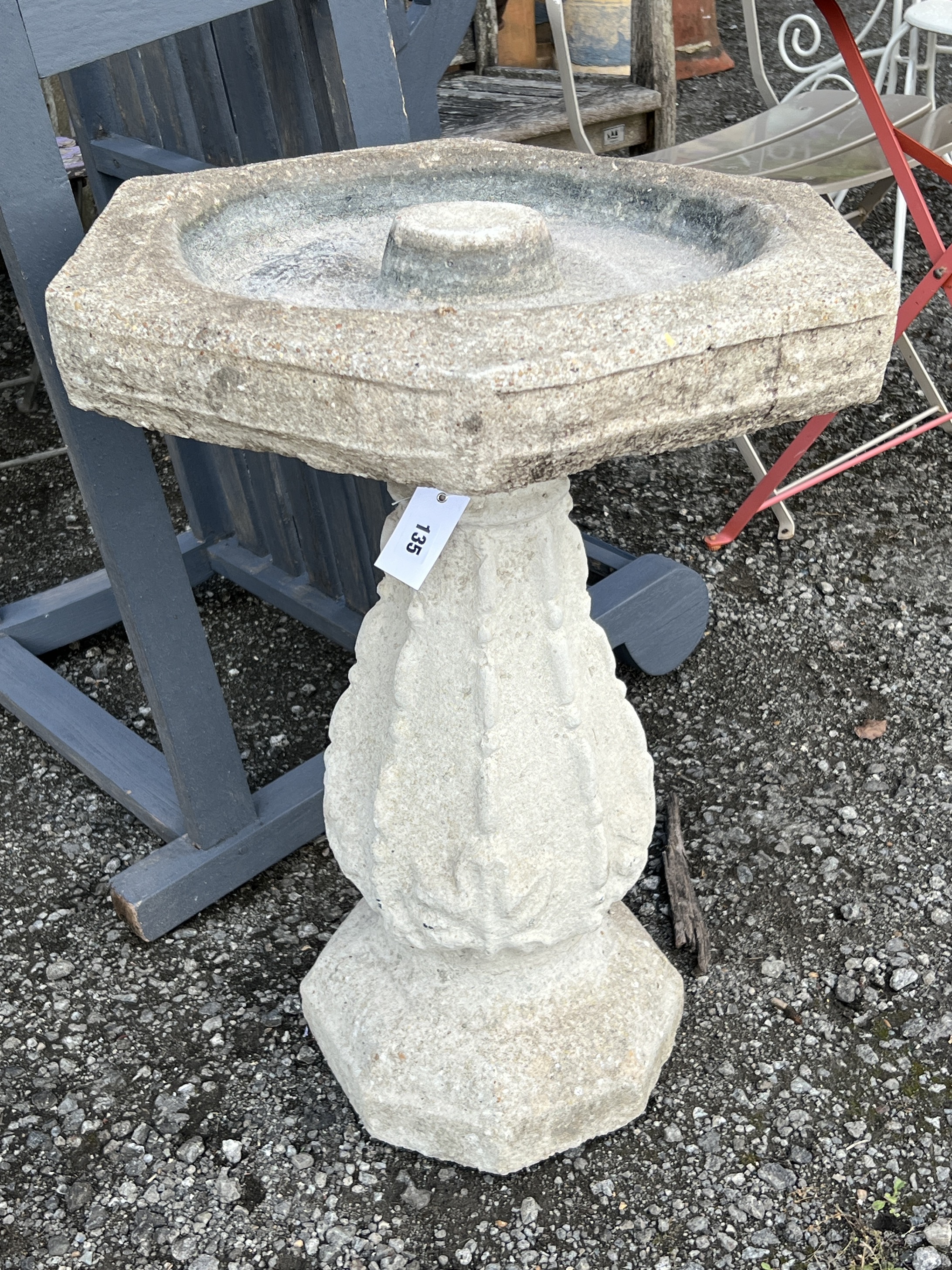 A reconstituted stone hexagonal bird bath, width 56cm, height 68cm